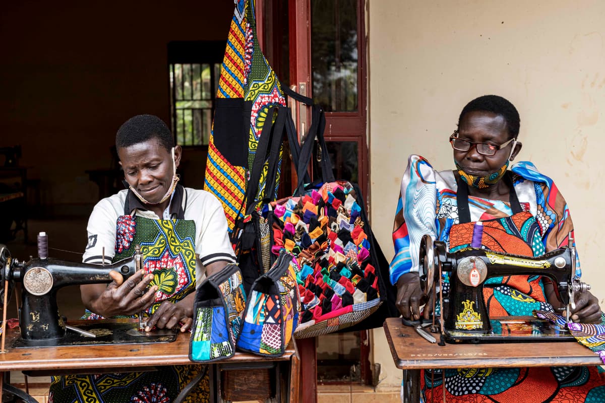 Group of women entrepreneurs collaborating or working on crafts/business.